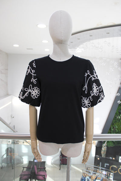 Blusa manga abullonada negra