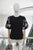 Blusa manga abullonada negra