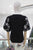 Blusa manga abullonada negra