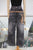 Jeans negros cinturones