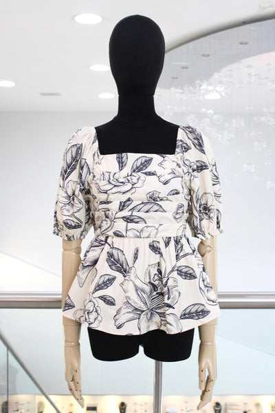 Blusa peplum beige con azul