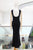 Vestido negro con aplicación dorada