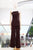 Conjunto chaleco strapless y pantalón café