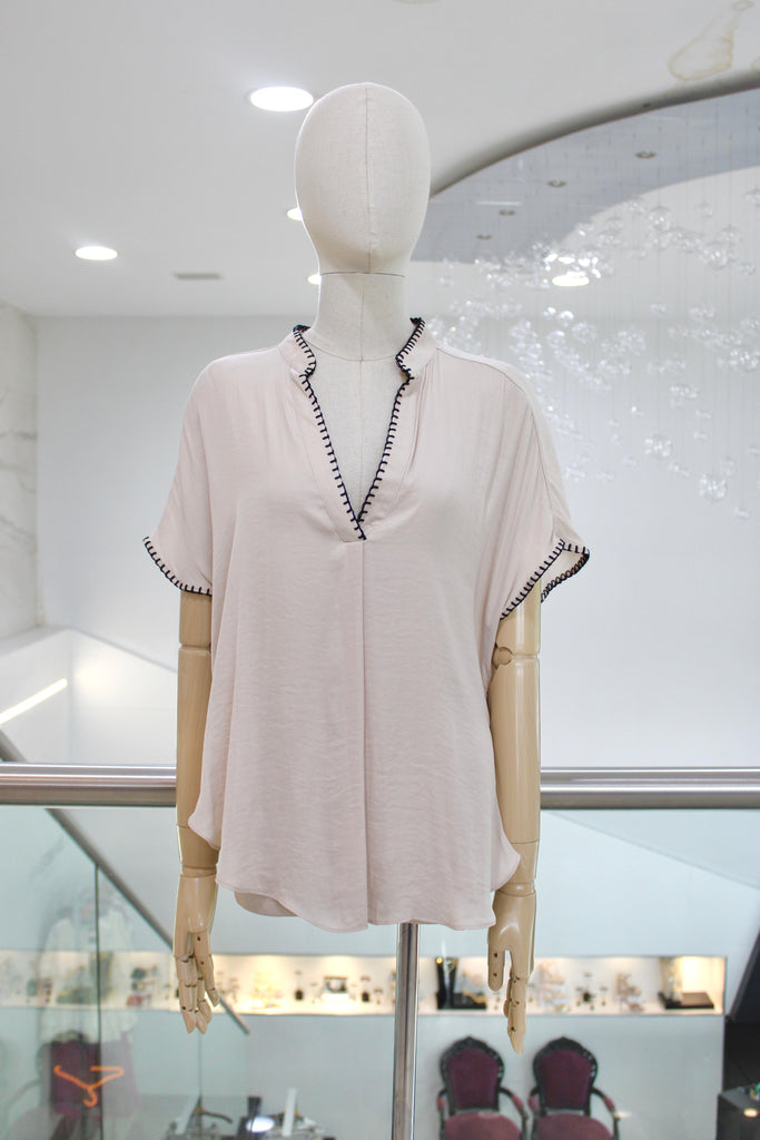 Blusa fluida beige con bordado