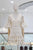 Vestido de guipur beige corto