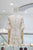Vestido de guipur beige corto