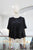 Blusa negra 50/30%