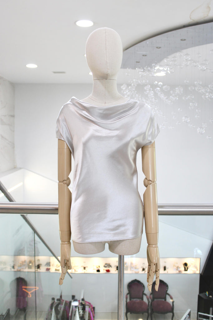 Blusa metálica plata