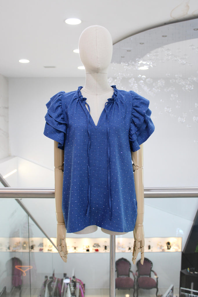 Blusa azul destellos