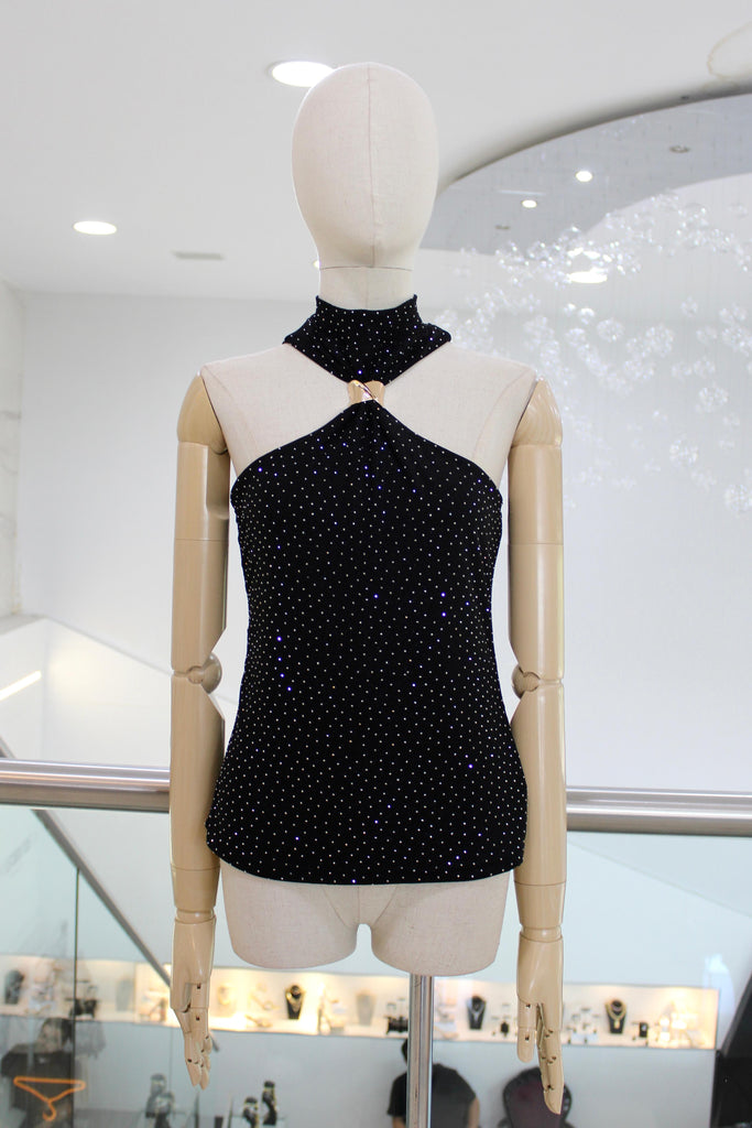 Blusa negra brillosa