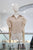 Blusa pedrería 70/50%