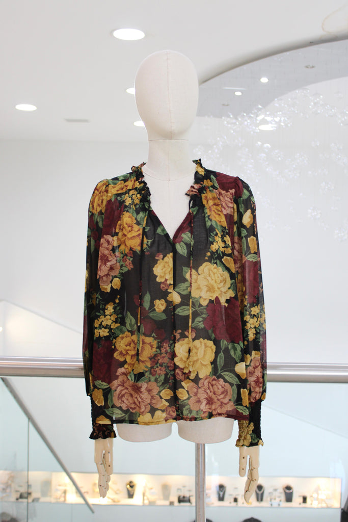 Blusa negra floral