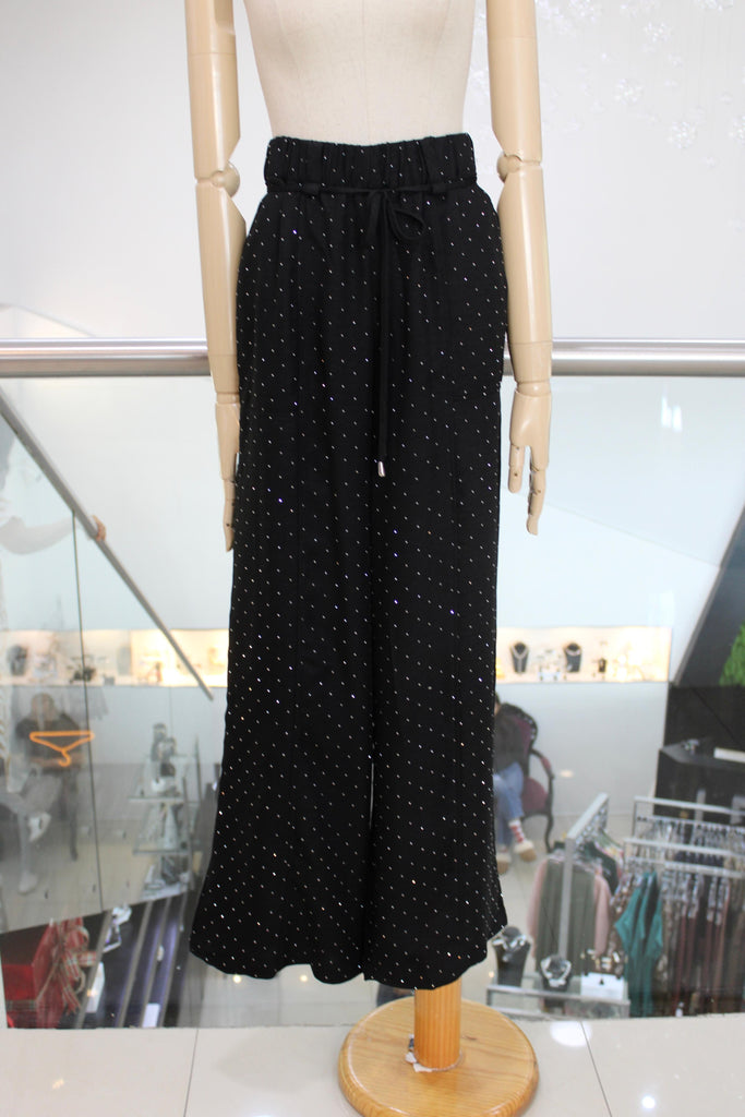 Pantalón negro destellos