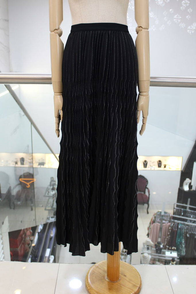 Falda plisada 30/15%