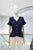 Blusa tejida azul marino