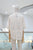 Camisa bordada beige