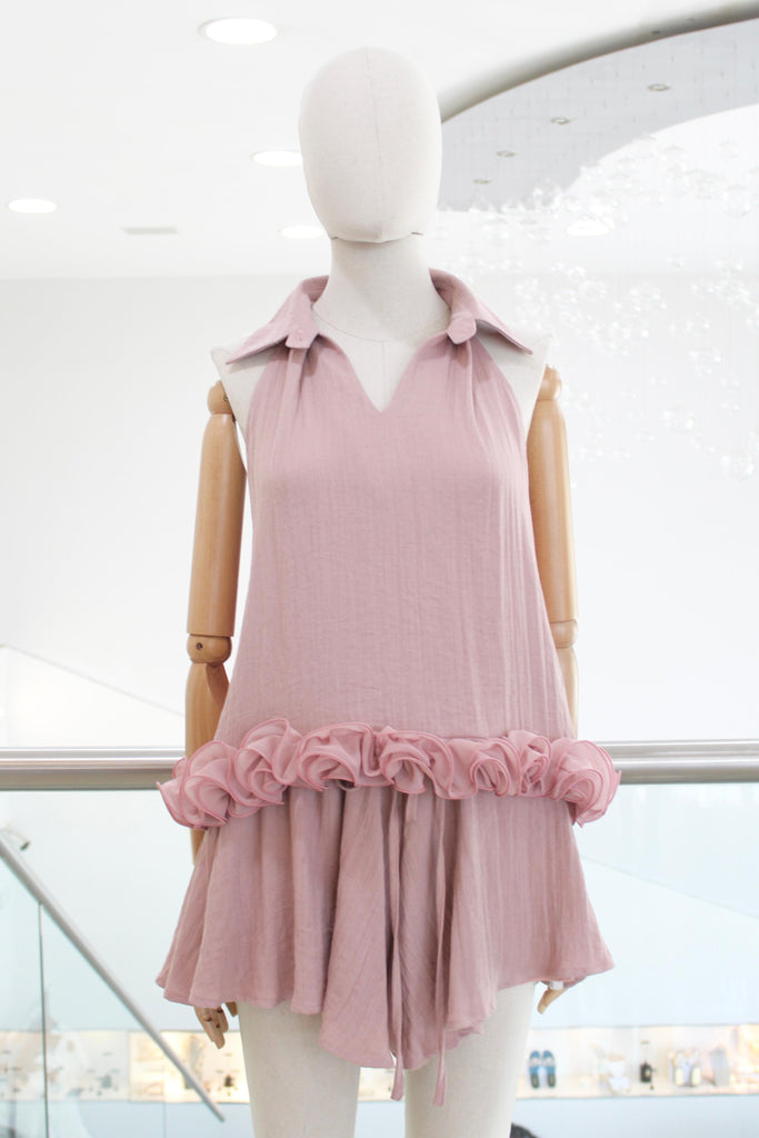 Conjunto rosa blusa y short