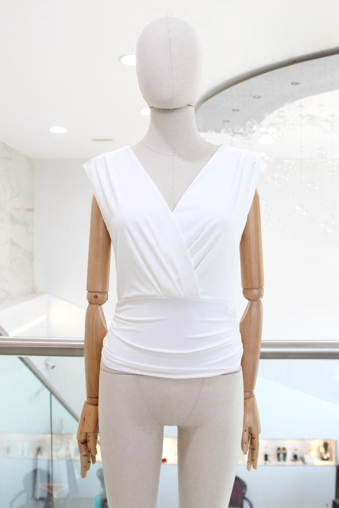 Blusa drapeada blanca