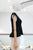 Blusa negra peplum