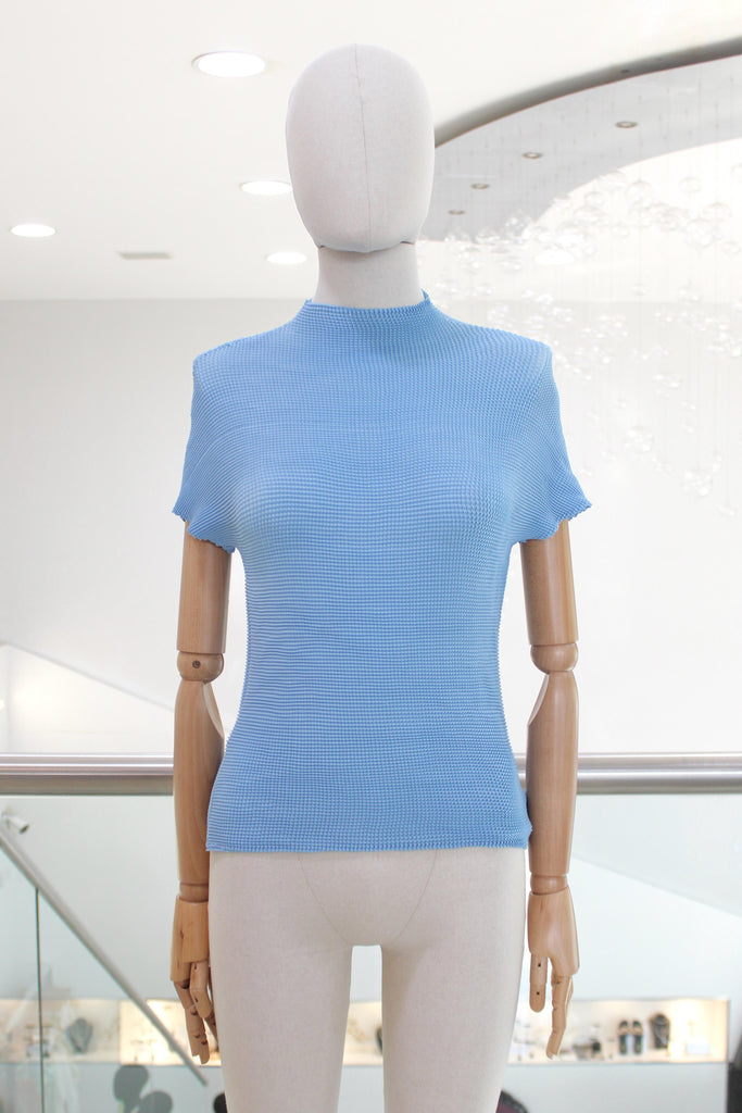 Blusa plisada azul claro