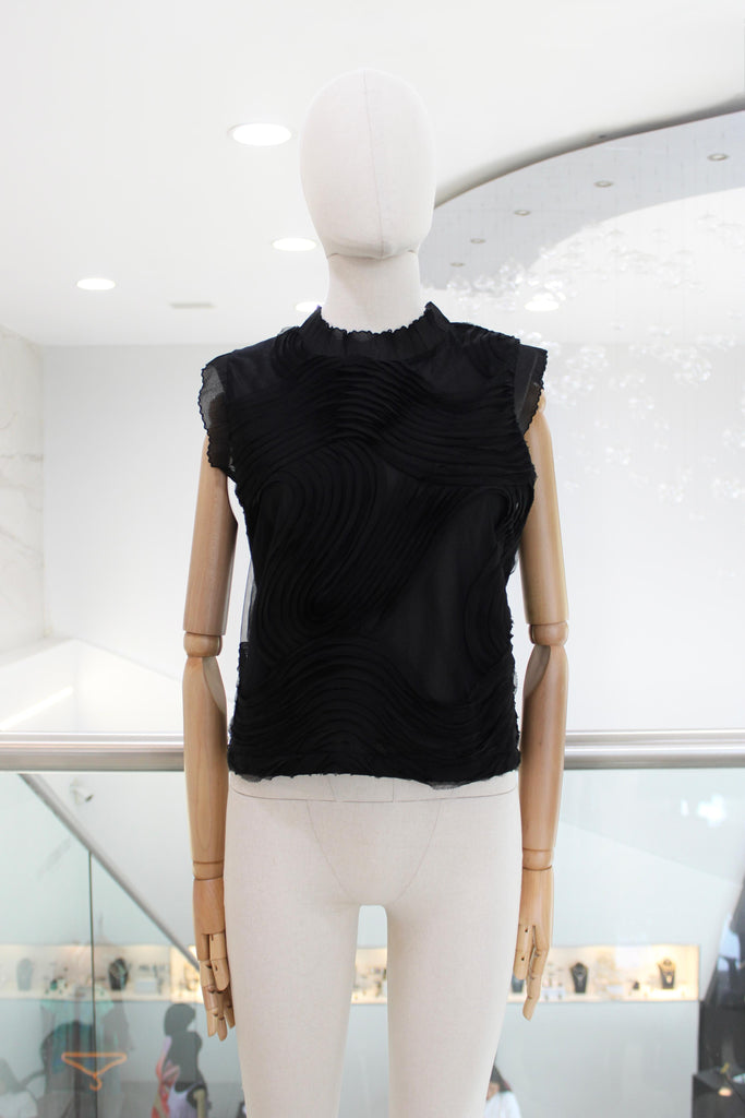 Blusa negra ondas