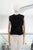 Blusa negra ondas