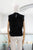 Blusa negra ondas