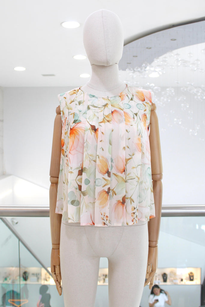 Blusa plisada floral
