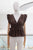Blusa café plisada