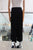 Pantalón plisado negro