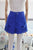 Short azul bordado