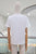 T-shirt blanca elefantes