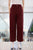 Pantalón rojo vino