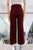 Pantalón rojo vino