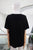 T-shirt negra hebillas