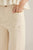 Pantalón denim beige