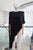 Blusa asimétrica negra