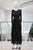 Conjunto negro plisado