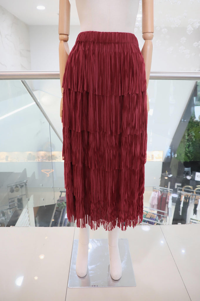Falda roja flecos