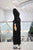 Conjunto negro plisado